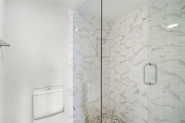 bathroom featuring an enclosed shower