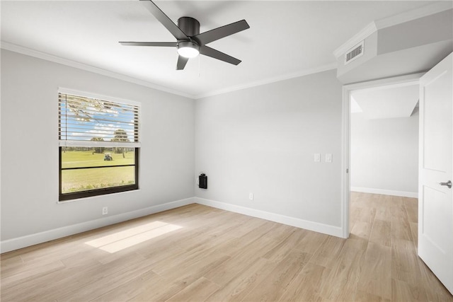 unfurnished room with crown molding, ceiling fan, and light hardwood / wood-style flooring