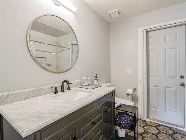 113 Larchmont Ter, Sebastian, FL 32958 - full bath featuring vanity, a textured ceiling, and a shower