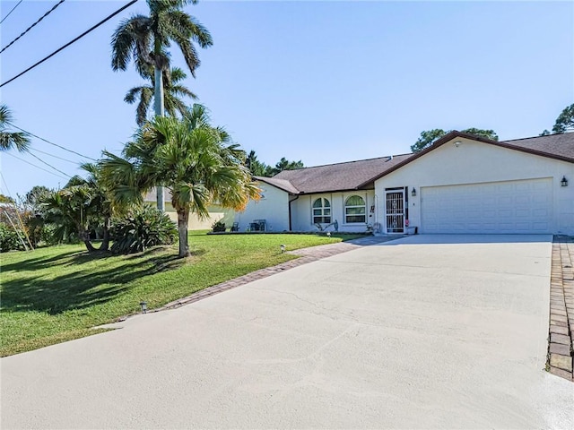 113 Larchmont Ter, Sebastian, FL 32958 - ranch-style house featuring an attached garage, stucco siding, a front lawn, and driveway
