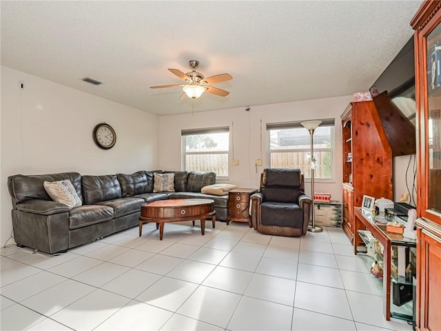 113 Larchmont Ter, Sebastian, FL 32958 - living room featuring ceiling fan and light tile patterned floors