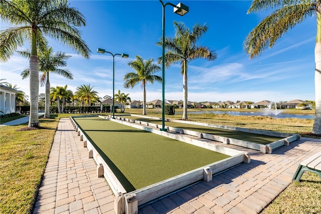 view of property's community with a water view