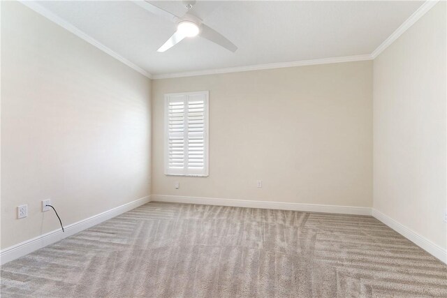 bathroom with toilet, vanity, and crown molding