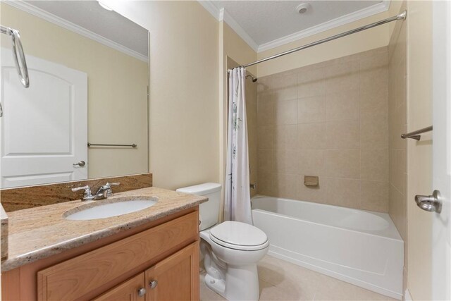 bedroom with a closet, light colored carpet, ceiling fan, and crown molding