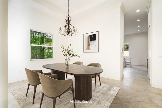 dining area with a notable chandelier, recessed lighting, and baseboards