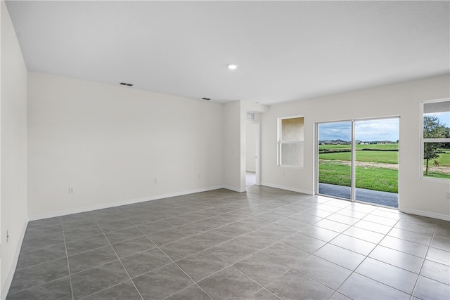 view of tiled spare room