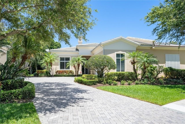 view of front of house with a front lawn