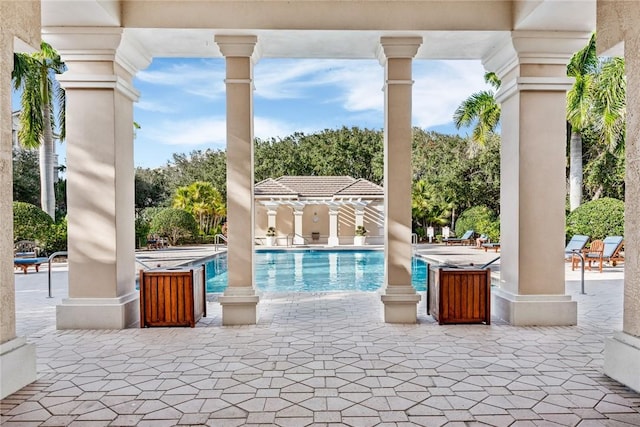 view of pool featuring a patio area