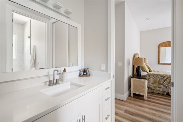 540 Marbrisa Dr, Vero Beach, FL 32963 - ensuite bathroom with wood finished floors, vanity, and connected bathroom