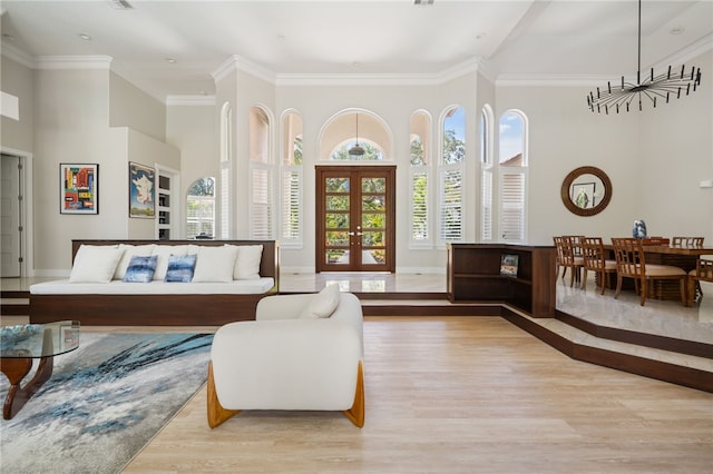 540 Marbrisa Dr, Vero Beach, FL 32963 - living area with a high ceiling, french doors, wood finished floors, and baseboards