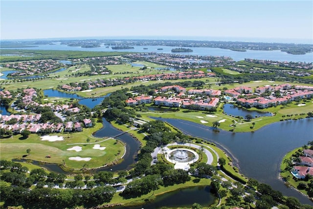 aerial view featuring a water view and view of golf course