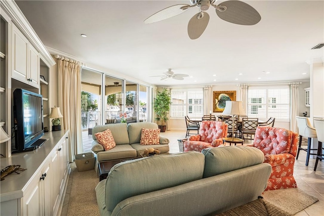 tiled living room with ceiling fan