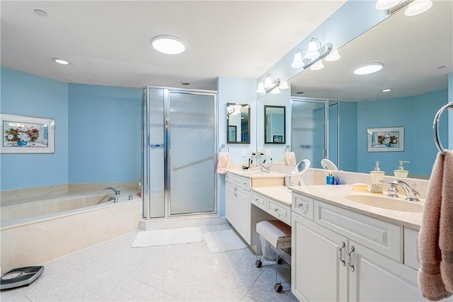 bathroom with tile patterned flooring, vanity, and independent shower and bath