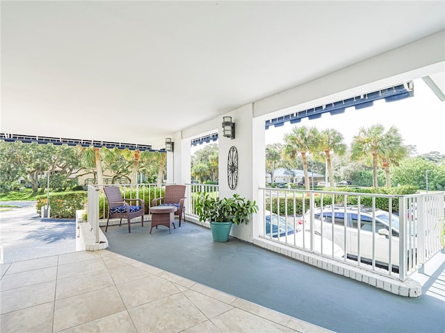 view of patio featuring a porch