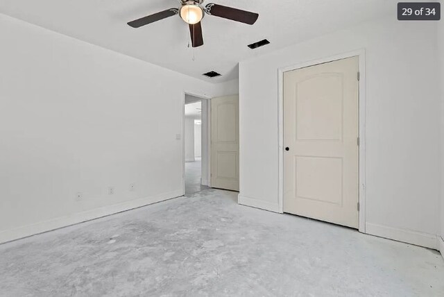 unfurnished bedroom featuring ceiling fan