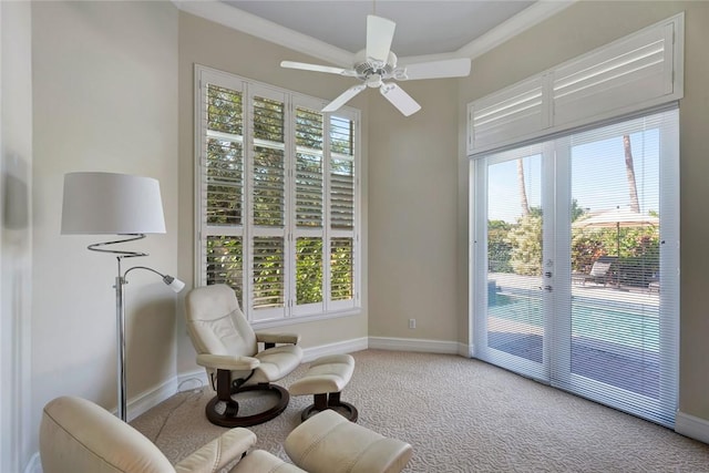 1300 Lake Bend Ct, Vero Beach, FL 32963 - living area featuring healthy amount of natural light, baseboards, carpet flooring, and a ceiling fan