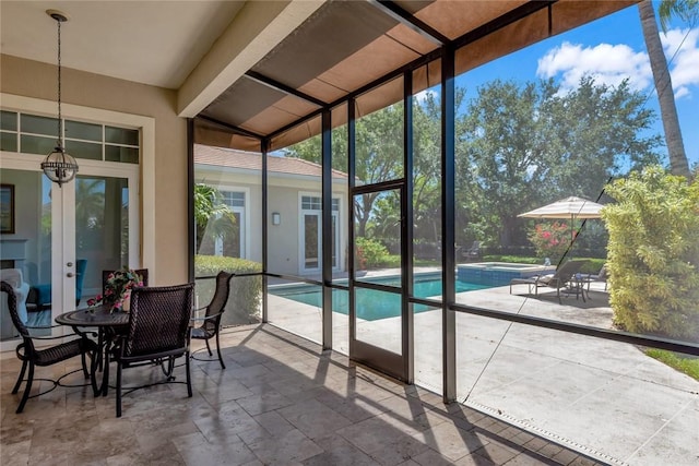 1300 Lake Bend Ct, Vero Beach, FL 32963 - sunroom featuring french doors and beamed ceiling
