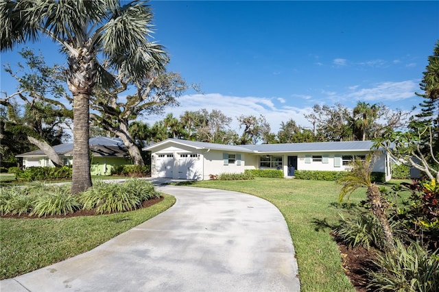 ranch-style home with a front lawn