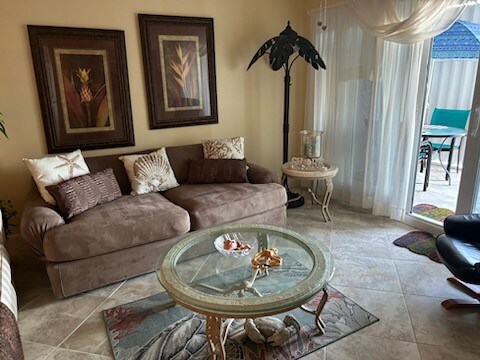 living room with light tile patterned floors