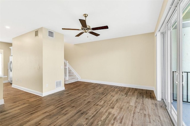 unfurnished living room with ceiling fan and light hardwood / wood-style flooring