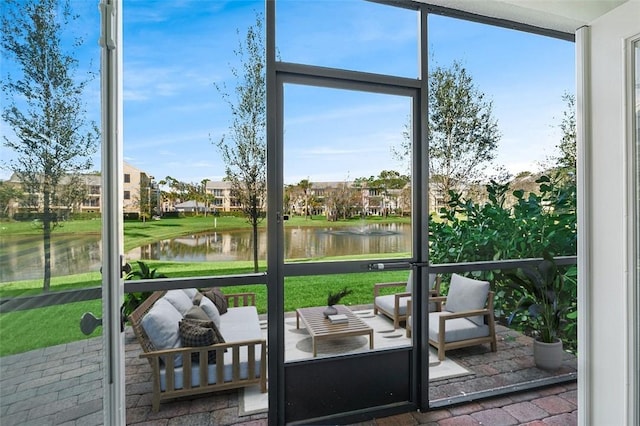 entryway with a water view