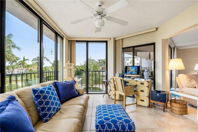 sunroom / solarium with ceiling fan