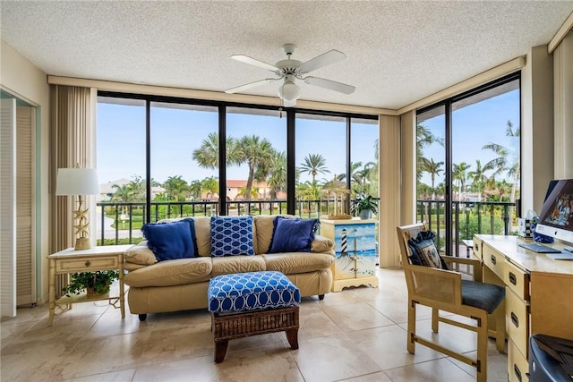 sunroom / solarium with ceiling fan