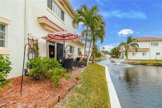 view of yard with a water view