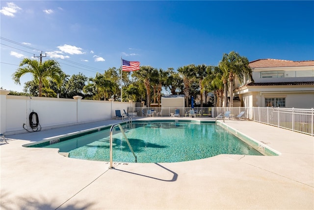 view of pool featuring a patio area