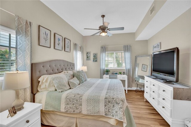 bedroom featuring ceiling fan and light hardwood / wood-style floors