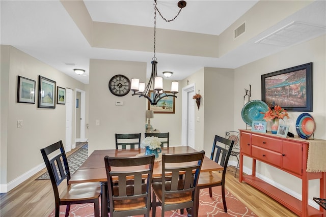 dining space featuring light hardwood / wood-style flooring