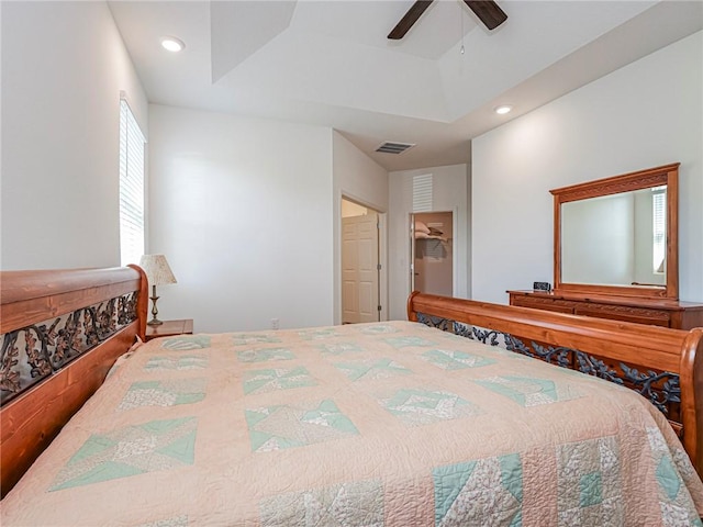 bedroom featuring visible vents, recessed lighting, a raised ceiling, and a ceiling fan