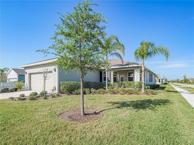 ranch-style home featuring stucco siding, an attached garage, concrete driveway, and a front lawn