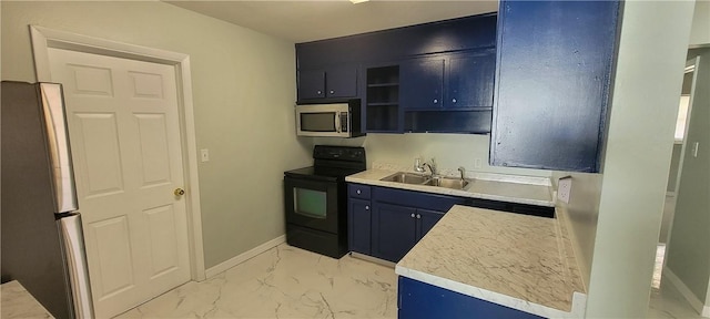 kitchen with appliances with stainless steel finishes, a sink, light marble finish floors, open shelves, and baseboards