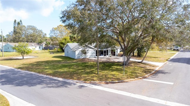 view of front of home featuring a front lawn