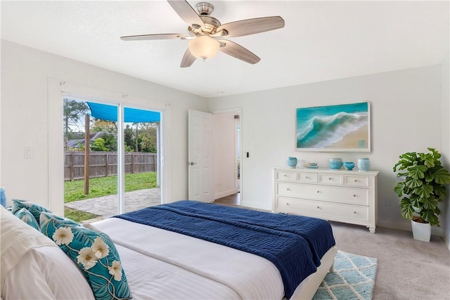 bedroom featuring light carpet, access to outside, and ceiling fan