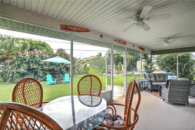 907 Starflower Ave, Sebastian, FL 32958 - sunroom featuring a ceiling fan, an outdoor hangout area, and outdoor dining space