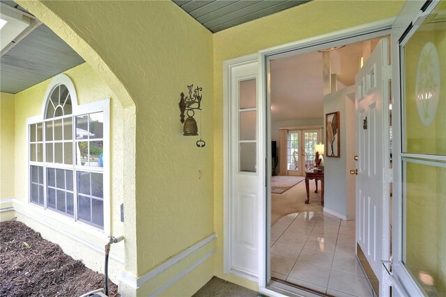 907 Starflower Ave, Sebastian, FL 32958 - entrance to property featuring french doors and stucco siding