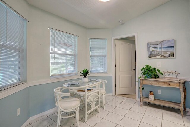 907 Starflower Ave, Sebastian, FL 32958 - dining area featuring light tile patterned floors and baseboards