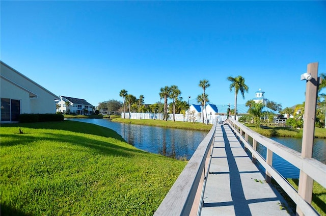 1910 Westminster Cir Unit 14-1, Vero Beach, FL 32966 - surrounding community featuring a yard, a water view, and a residential view