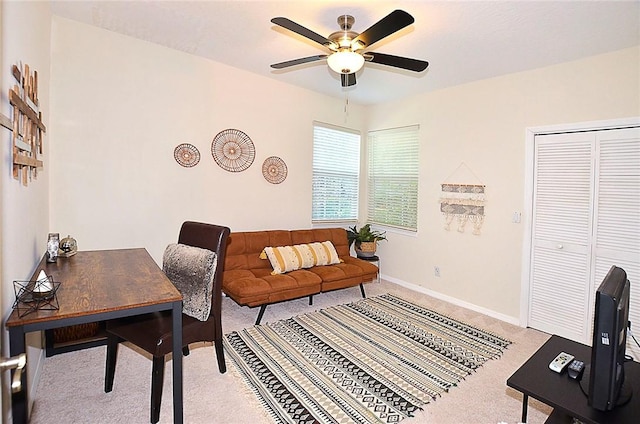 1910 Westminster Cir Unit 14-1, Vero Beach, FL 32966 - office area featuring light colored carpet, ceiling fan, and baseboards