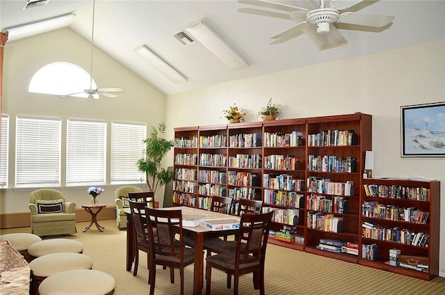 1910 Westminster Cir Unit 14-1, Vero Beach, FL 32966 - carpeted dining area featuring a ceiling fan, healthy amount of natural light, and high vaulted ceiling