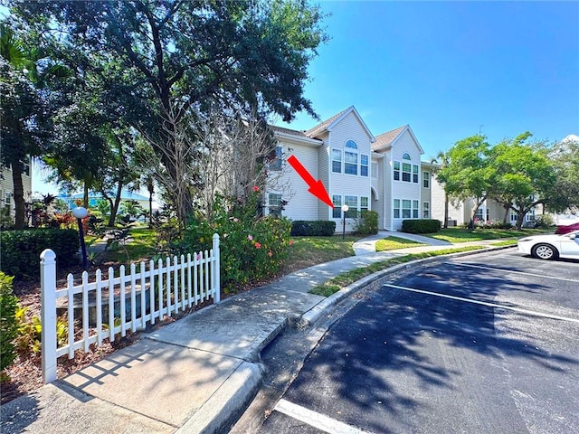 1910 Westminster Cir Unit 14-1, Vero Beach, FL 32966 - view of front of property featuring uncovered parking