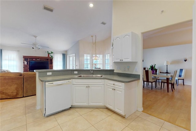 kitchen with visible vents, open floor plan, white cabinetry, a sink, and dishwasher