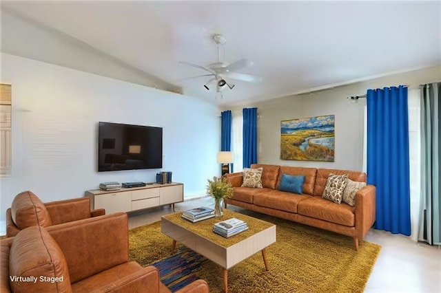 living room with lofted ceiling and ceiling fan