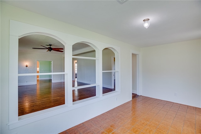 empty room featuring ceiling fan