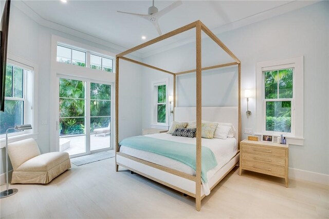 110 Mariner Beach Ln, Vero Beach, FL 32963 - bedroom featuring access to exterior, light wood-style flooring, baseboards, and ceiling fan