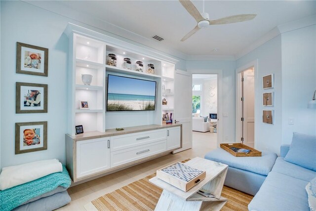 110 Mariner Beach Ln, Vero Beach, FL 32963 - living area with ceiling fan, ornamental molding, and light wood-style flooring