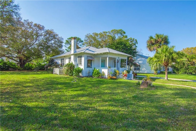 single story home with a front yard