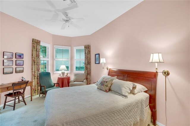 1725 Victoria Cir, Vero Beach, FL 32967 - bedroom with visible vents, baseboards, light colored carpet, and a ceiling fan